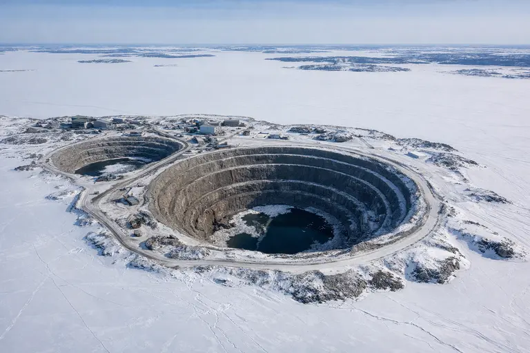 An aerial view of the frozen Diavik Diamond Mine open pit in Canada.
