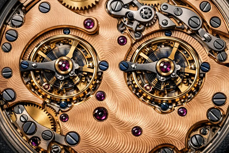 A close-up of the 18k rose gold movement inside FP Journe Watches showing fine finishing.
