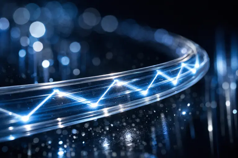 A bundle of glowing fiber optic cables made from synthetic fused silica.